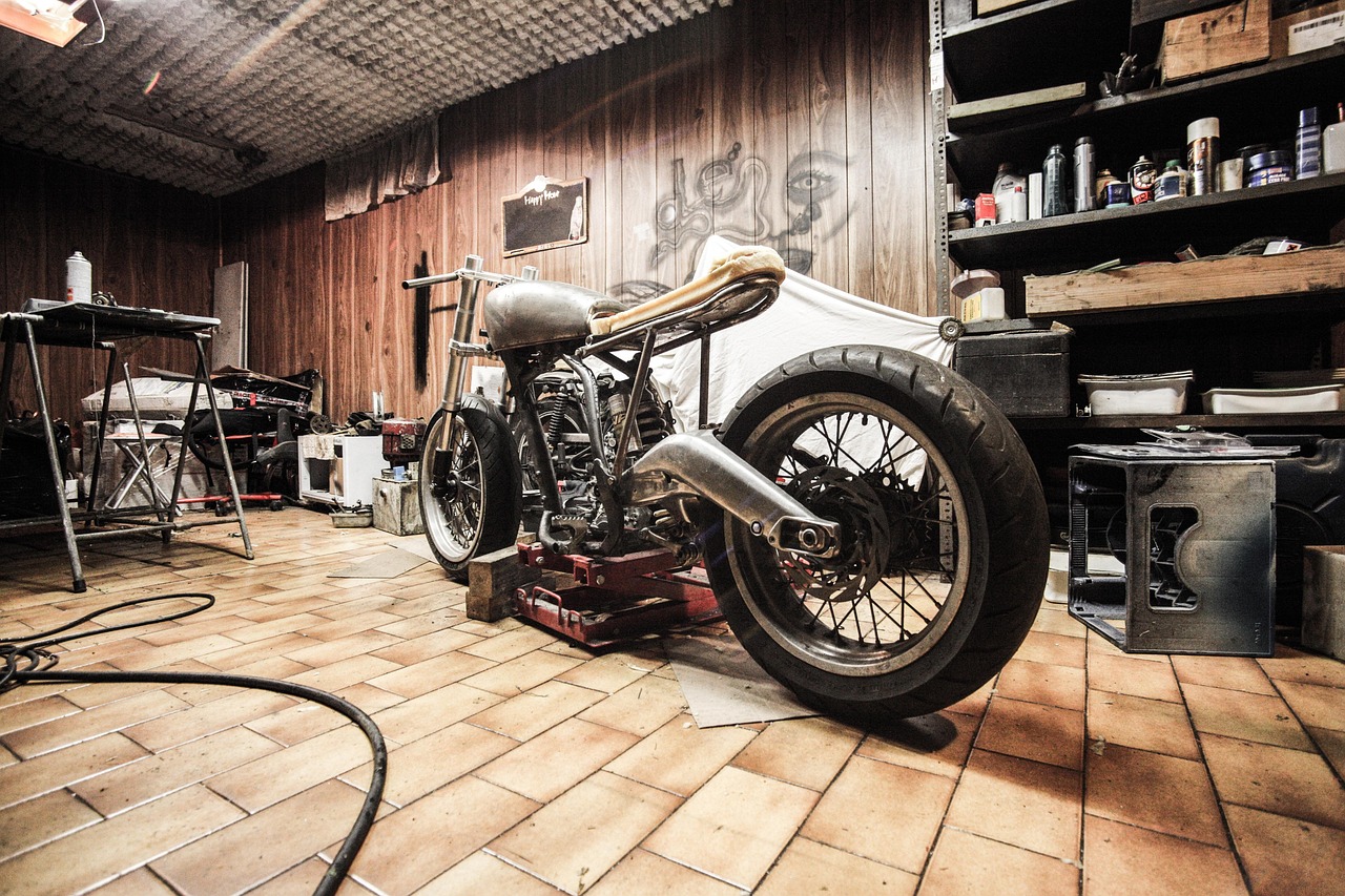 Motorbike, garage, repairs — Cool Differences: How AC Systems Vary in Sedans, SUVs, and Trucks